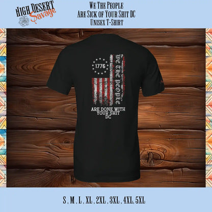 We The People with the 1776 Flag and "Are Done With Your Shit DC" underneath in color (red & white) printed on the back of a Bella Unisex T-shirt in Black