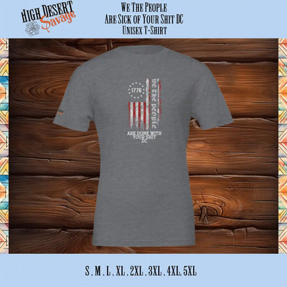 We The People with the 1776 Flag and "Are Done With Your Shit DC" underneath in color (red & white) printed on the back of a Bella Unisex T-shirt in Heather Storm